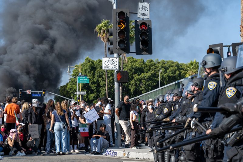Protestors and police in Los Angeles face each other during demonstrations about immigration raids
